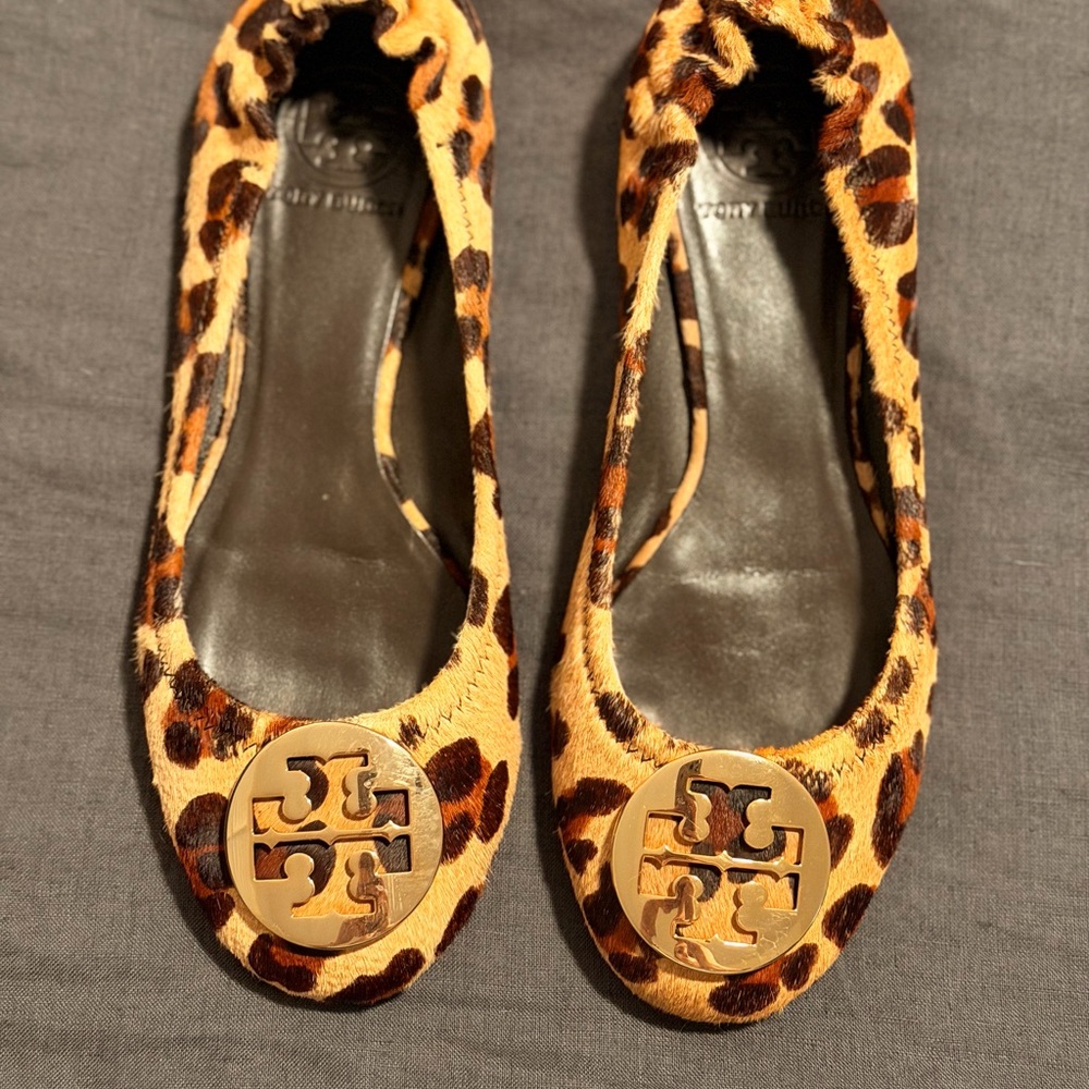Tory Burch cheetah print flats with gold logo
